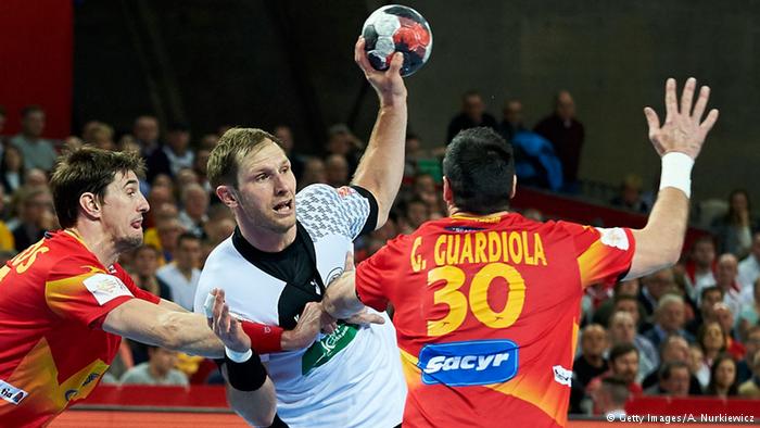 German handball players reach for the stars