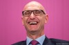 Telekom-the boss has a good laugh
